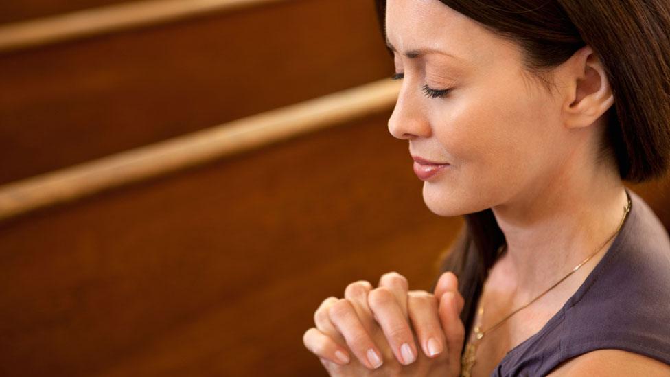 Woman at prayer