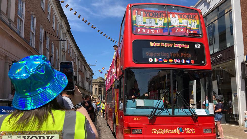 Open top bus on parade