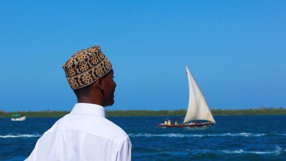 Man looking towards the sea on March 4, 2011 in Lamu, Kenya.