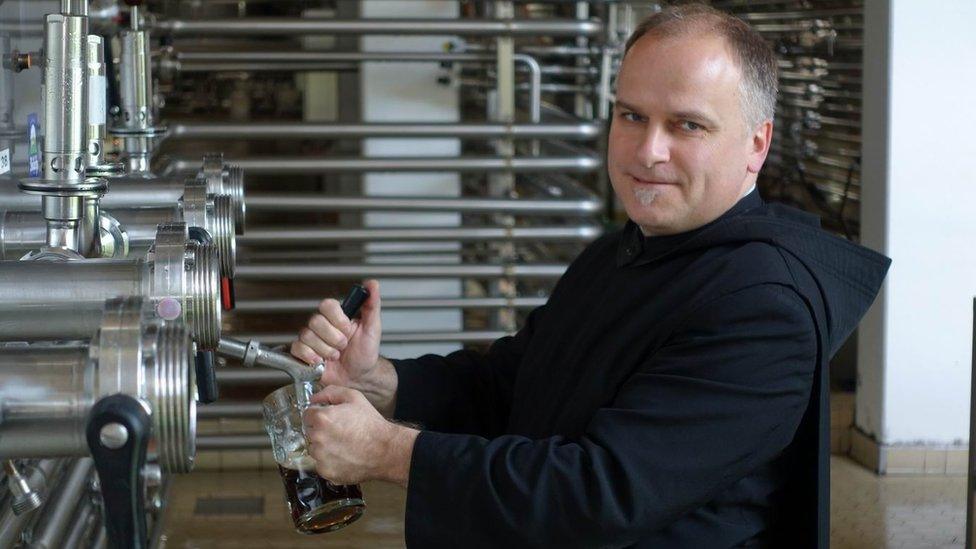 Monk checks brewing process at Andechs