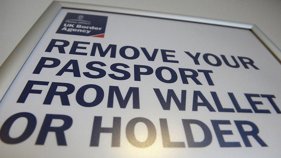 Immigration and border control signs at Edinburgh Airport