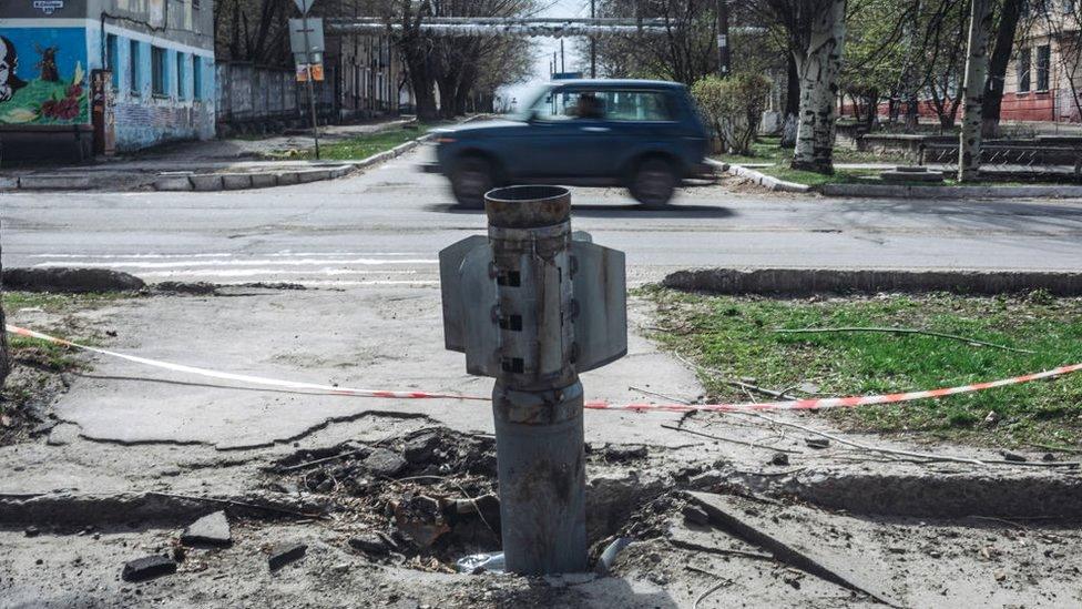 A rocket in the ground is seen in Lysychansk, Donbass, Ukraine