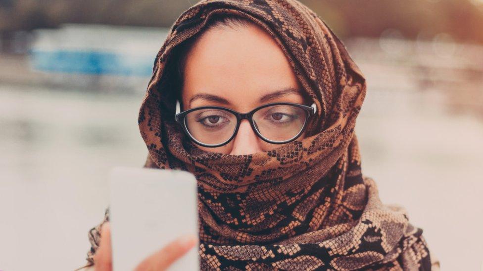 Woman looking at phone