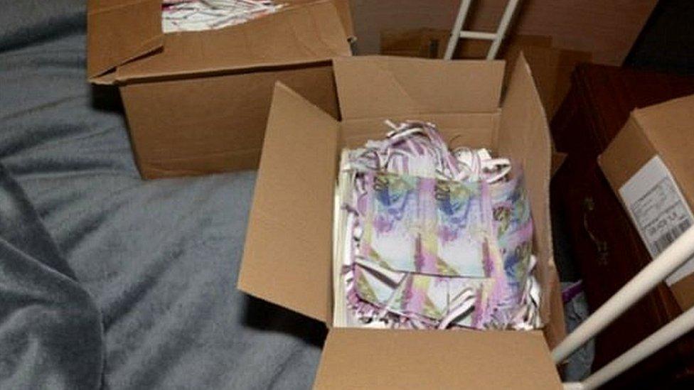 Boxes of fake banknotes found by police