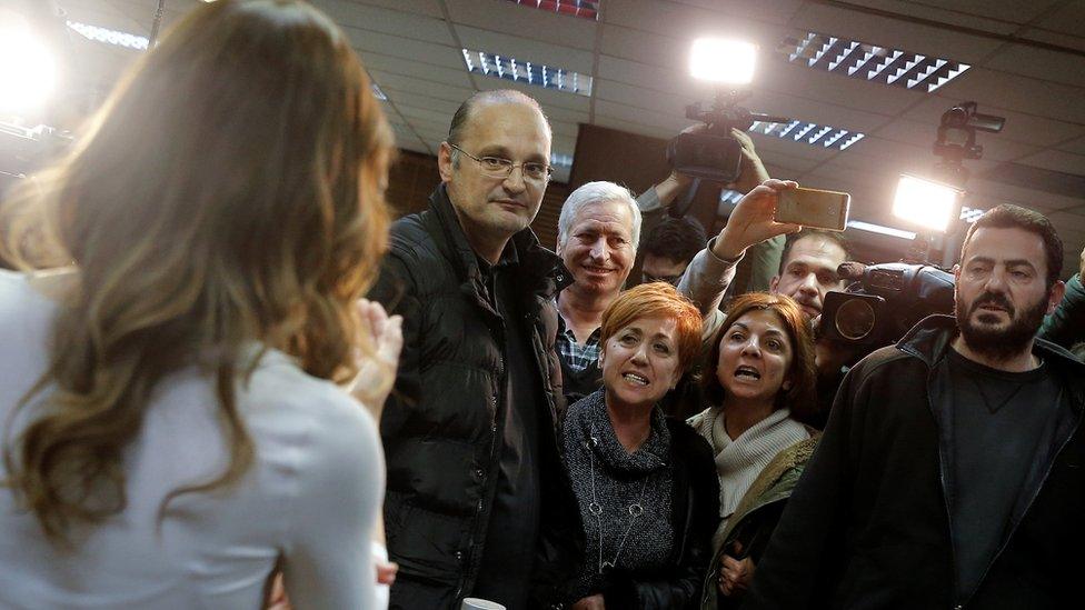 Protesters from the Communist-affiliated trade union PAME argue with Greek Labour Minister Effie Achtsioglou (L), 9 Jan 18