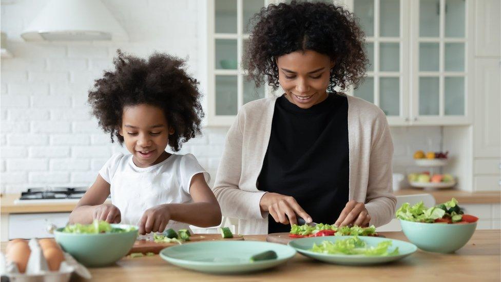 mum and daughter cooking