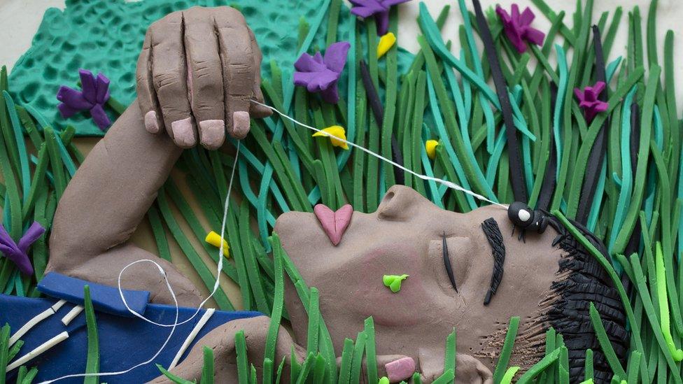 Boy with June Bug by Gordon Parks recreated using playdough