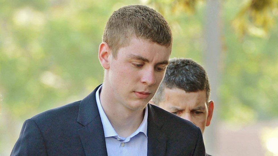 Brock Turner, 20, right, makes his way into the Santa Clara Superior Courthouse