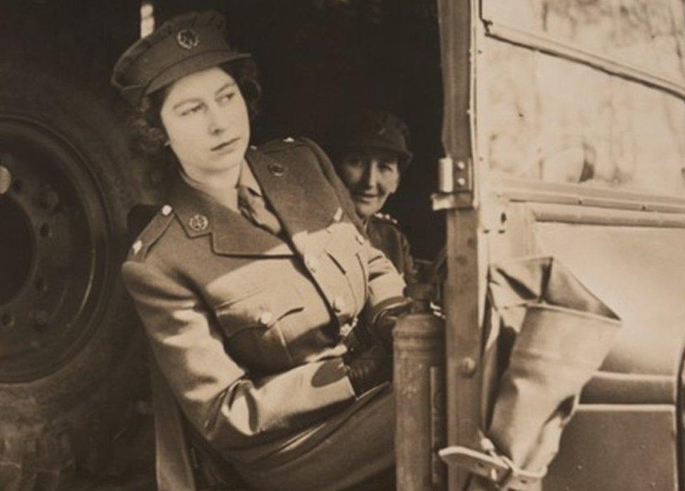 Queen Elizabeth II with her driving instructor, Major Violet Wellesley