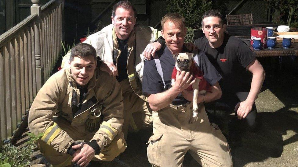 Kiki pictured with the fire crew