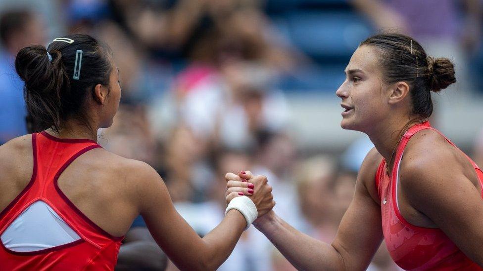 Winner Aryna Sabalenka of Belarus is congratulated at the net by Qinwen Zheng of China after their Women's Singles Quarter-Finals match