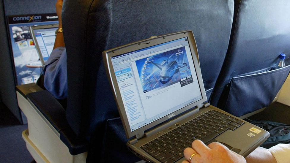 Laptop user on a flight