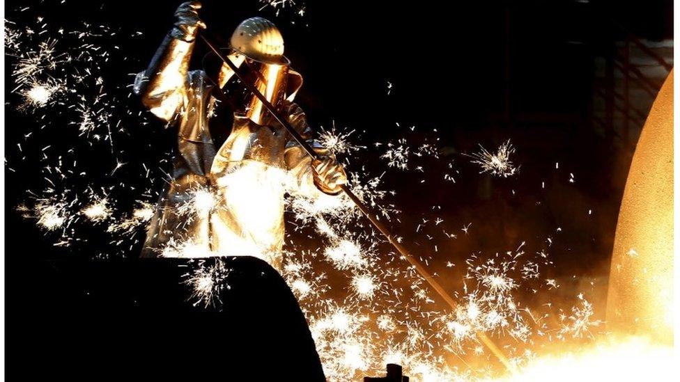 Steel worker in a blast furnace at ThyssenKrupp steelworks in Duisburg, Germany