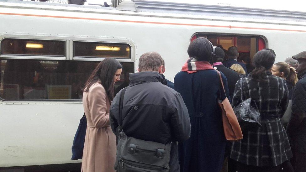 Passengers get onto an Greater Anglia service train