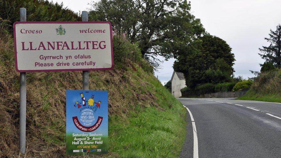 Llanfallteg sign at Login