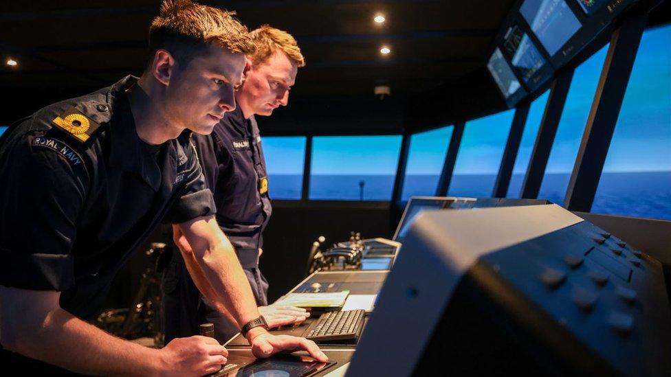 Sailors use simulator