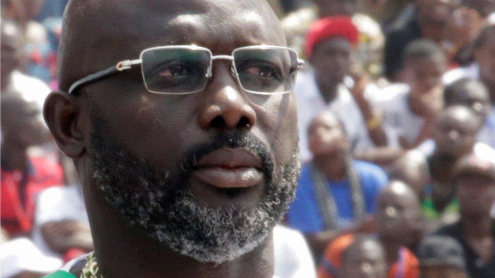 Liberia's President George Weah looks on as he attends his swearing-in ceremony at Samuel Kanyon Doe Sports Complex in Monrovia, Liberia, January 22, 2018.