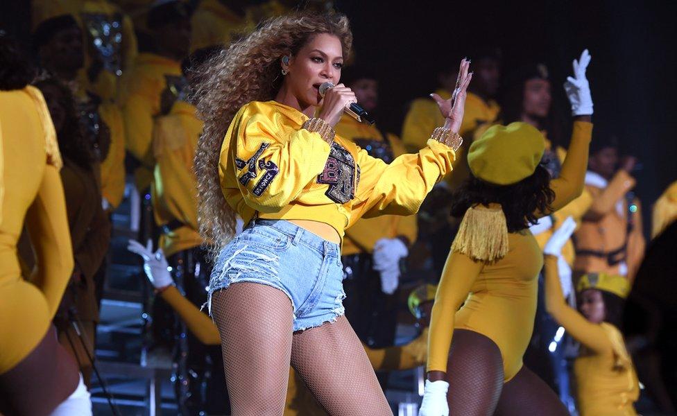 Beyonce and dancers on stage at Coachella