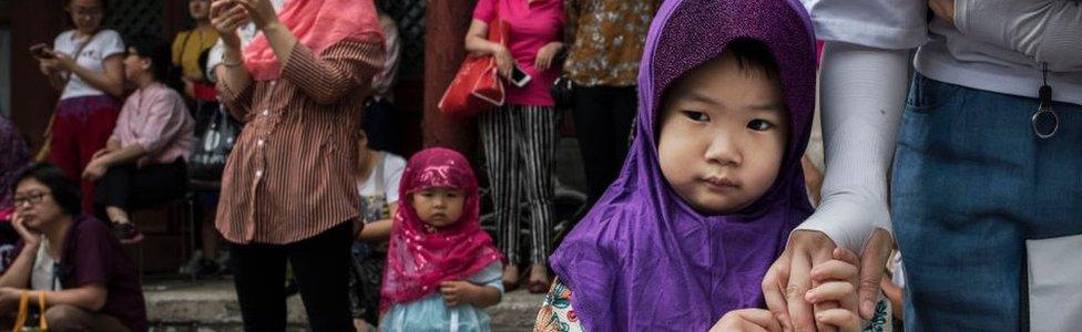 Chinese Hui Muslims gather before Eid al-Fitr prayers