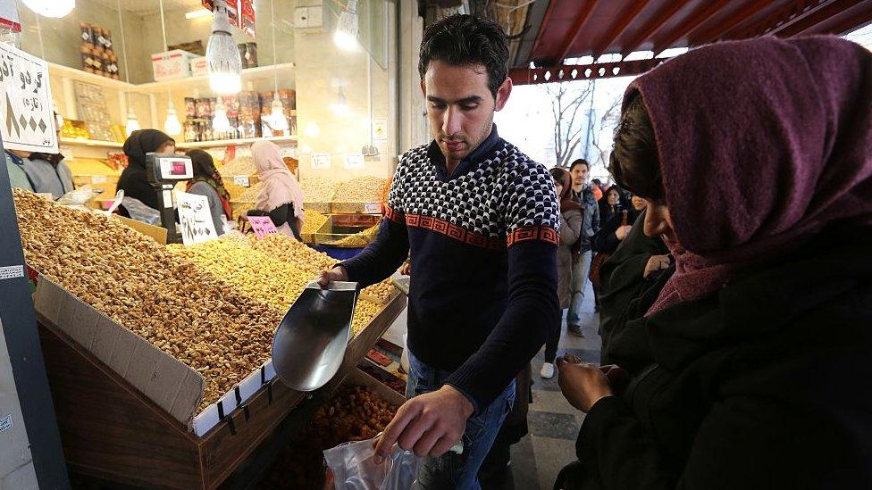 Iranians shop in Tehran's Grand Bazaar (file photo)