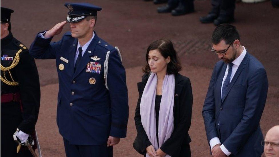 Delegates from the United States Embassy during a minute's silence at the Guard Change at Windsor Castle