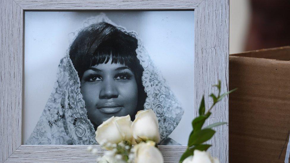 Flowers and tributes are placed on the Star for Aretha Franklin on the Hollywood Walk of Fame in Hollywood, California, August 16, 2018