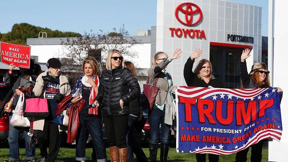 Trump supporters outside a Toyota building