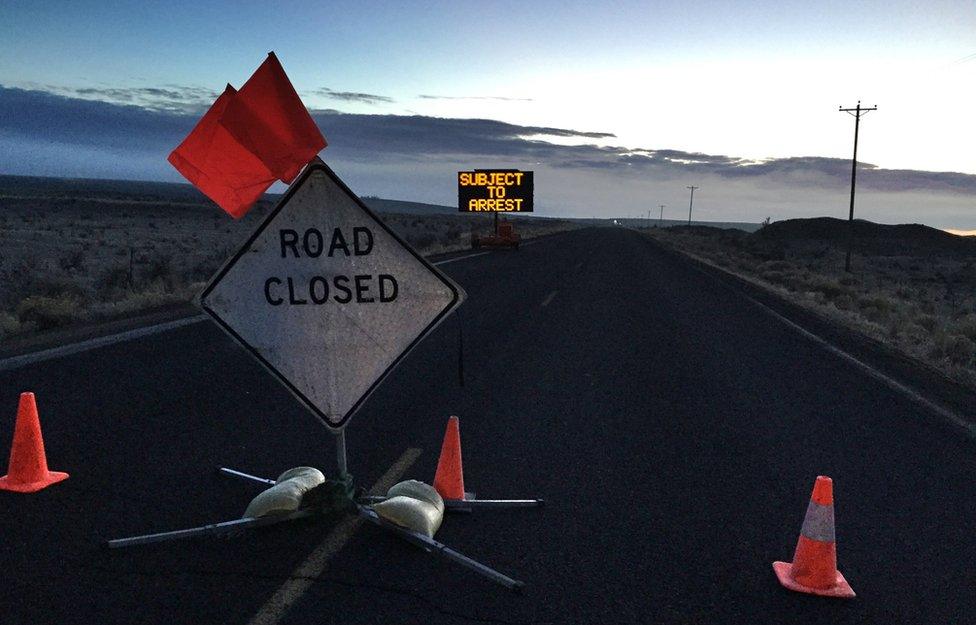 A road is closed leading up to the refuge