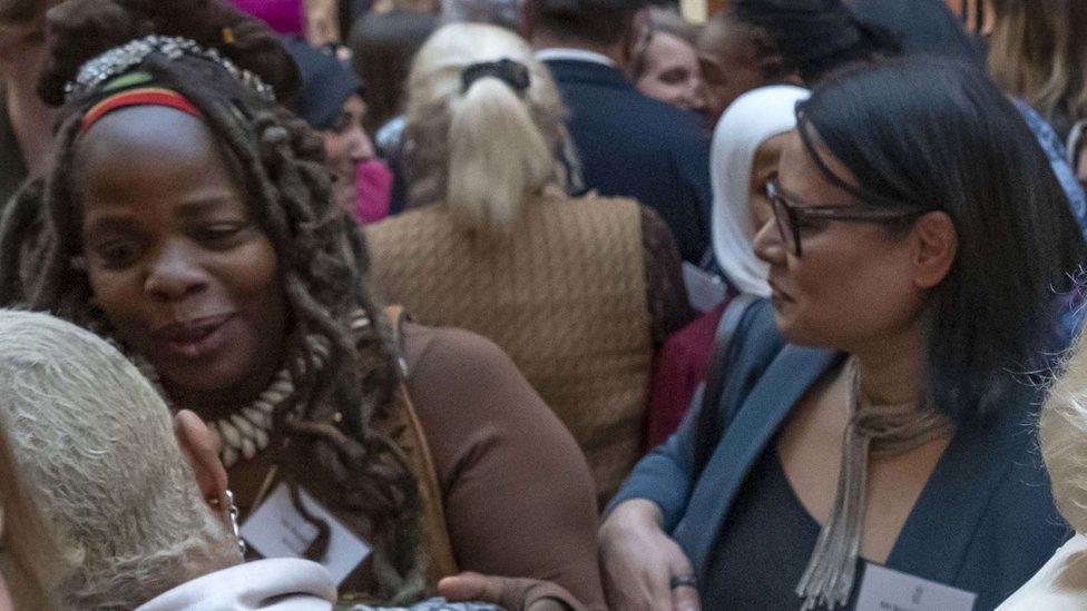 Ngozi Fulani (left) was a guest at the Buckingham Palace reception