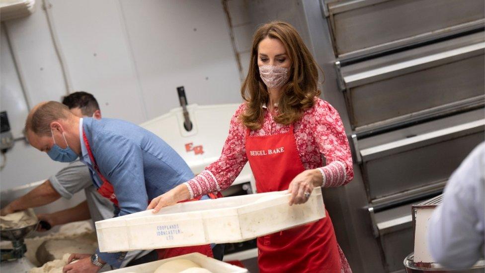 Prince William and Catherine helping out on a visit to a bakery in East London