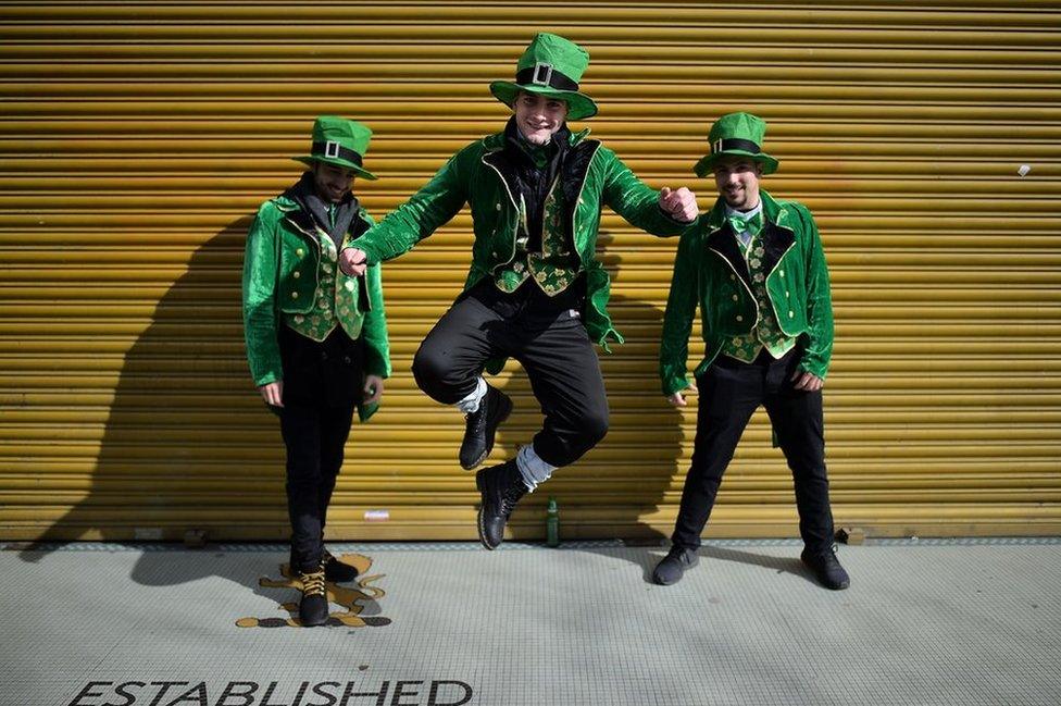 Revellers attend the Saint Patrick's Day parade in Dublin, Ireland.