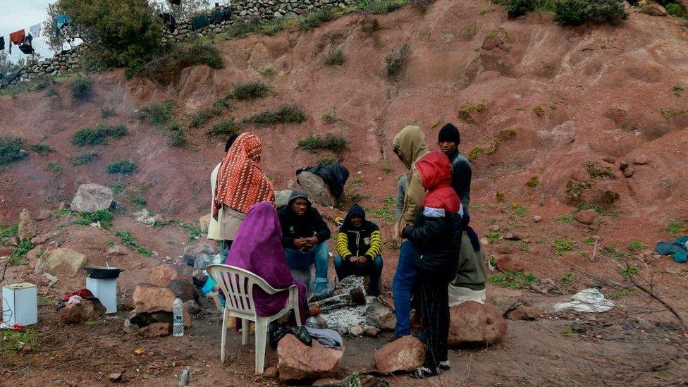 Migrants from sub-Saharan African countries who arrived on the island of Lesbos five days ago, remain in quarantine in an open space designated by the Greek authorities, on the island of Lesbos, as Greece tries to control the spread of the novel coronavirus, COVID-19 on April 5, 2020