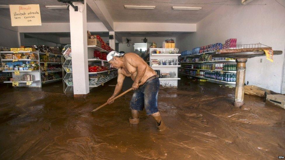 Supermarket owner in Barra Longa, Minas Gerais, Brazil