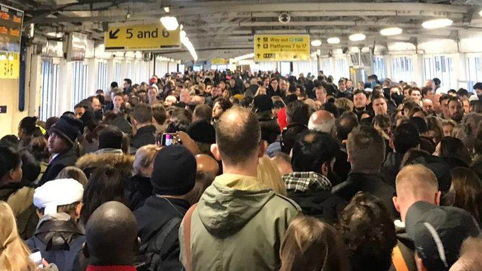 Lots of people bundle into Clapham Junction station