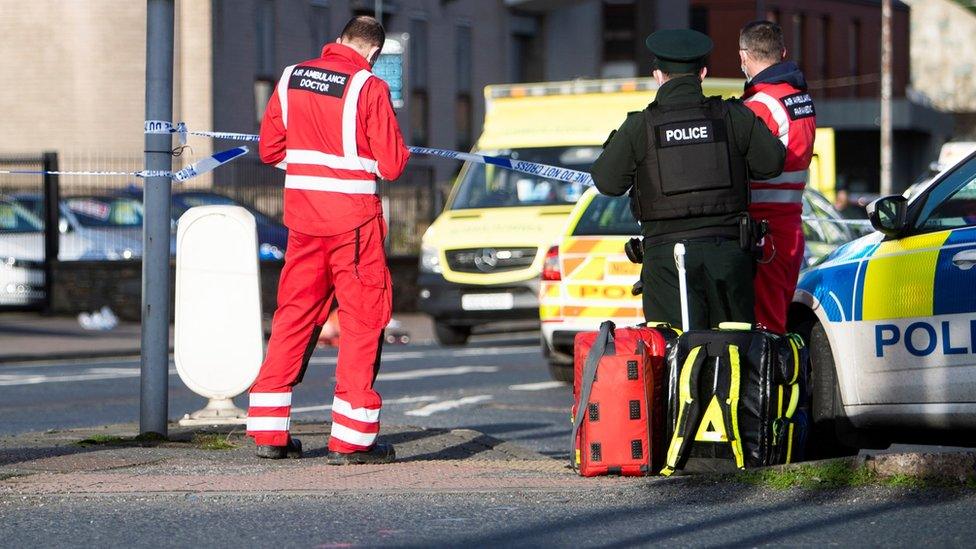 Ambulance staff and police at scene of Downpatrick assault