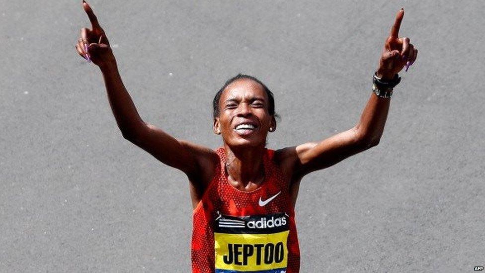 Rita Jeptoo of Kenya celebrates after winning the 118th Boston Marathon on April 21, 2014 in Boston, Massachusetts