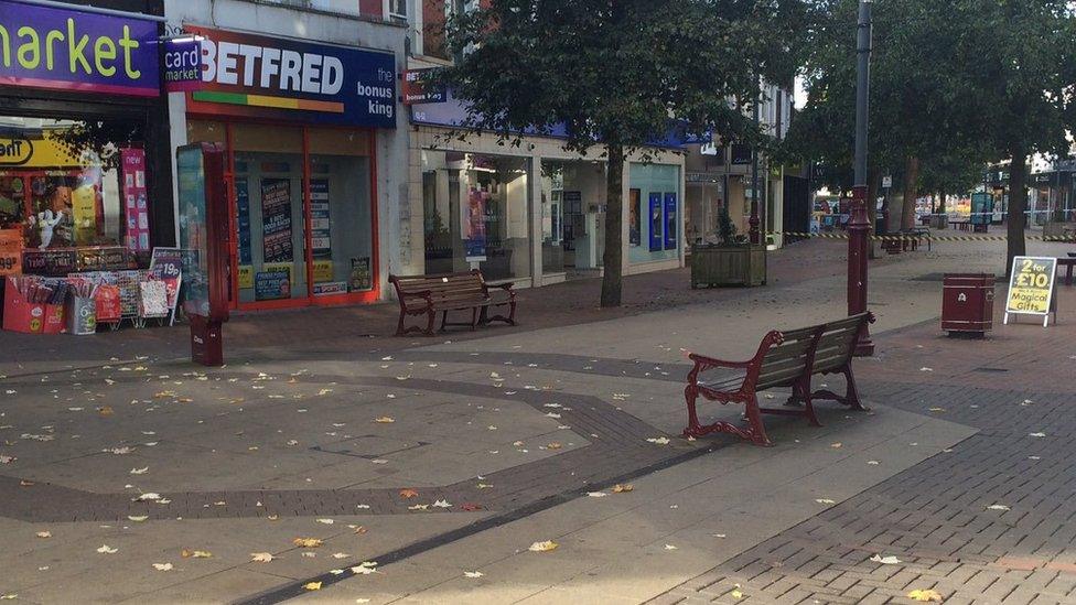 The Calverley Road shopping precinct empty after police evacuated the area