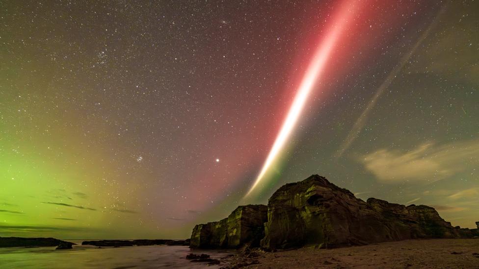 Ribbon of purple light during an aurora event known as Steve