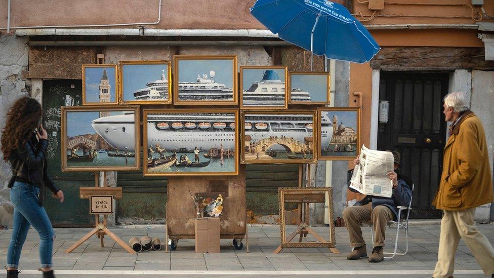 Banksy shows off new artwork of giant cruise ship in the middle of Venice.