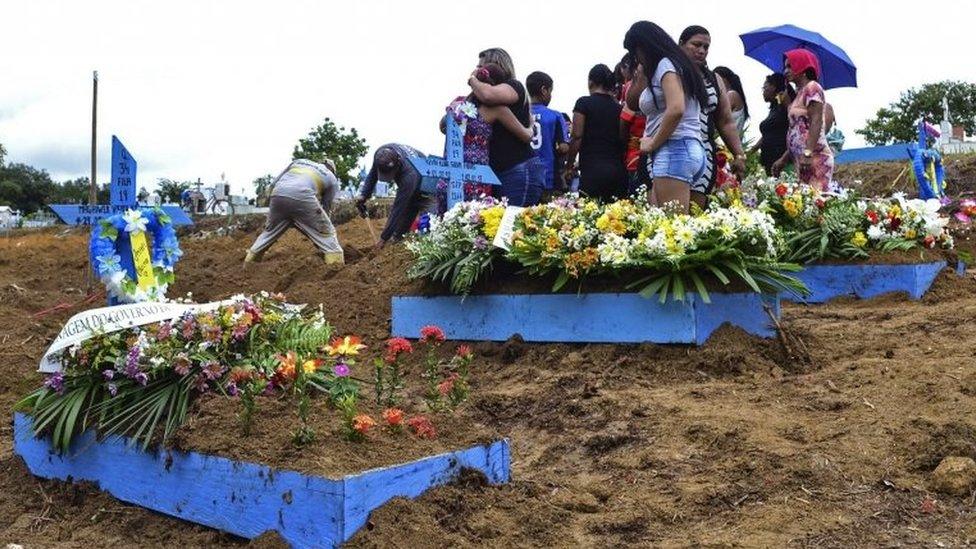 Relatives of prisoners who were victims of a recent prison riot, bury their loved ones during a funeral service in Manaus, Brazil, 04 January 2017.