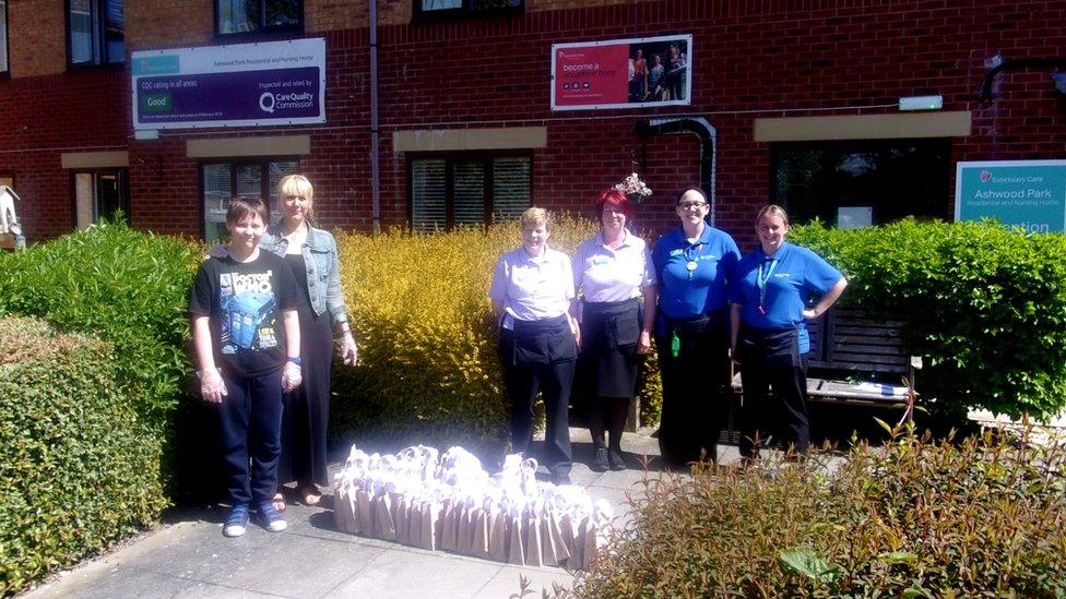 Dropping off bags at a care home