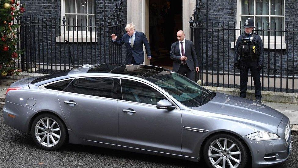 Boris-Johnson-getting-in-his-car.