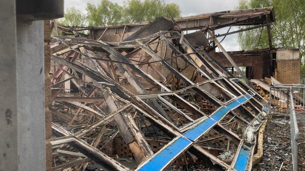 Burnt out building at the Grange School