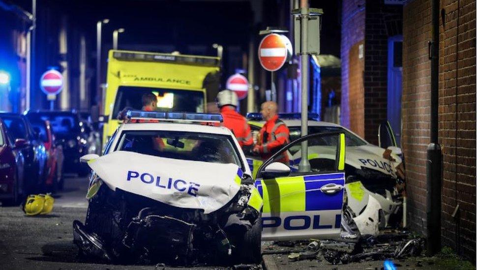 Two police cars after the crash