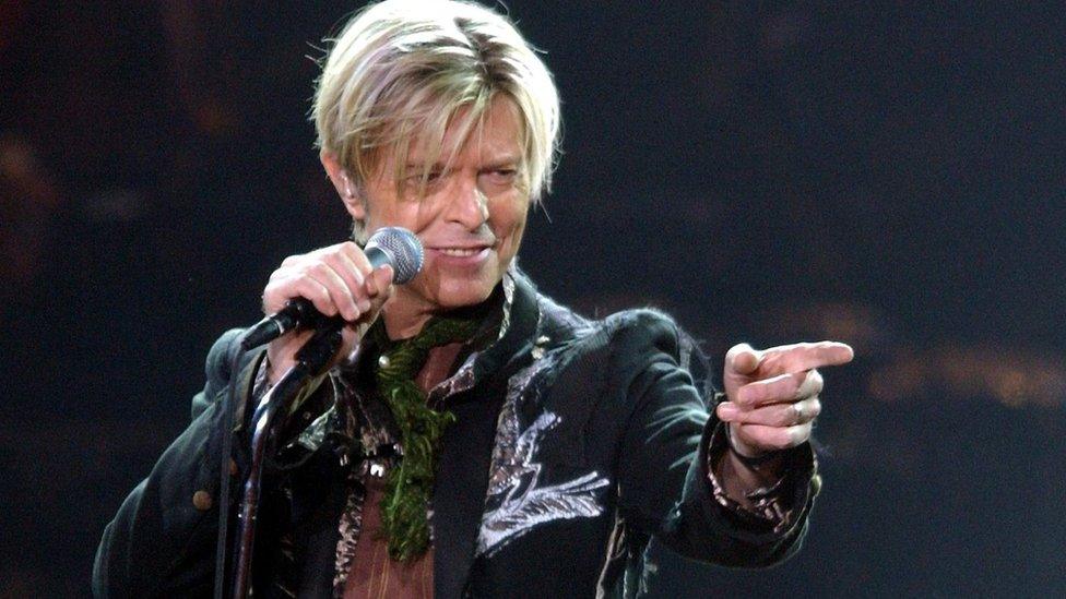 A file photograph showing British rock legend David Bowie performing on stage during his concert in Hamburg, Germany, 16 October 2003