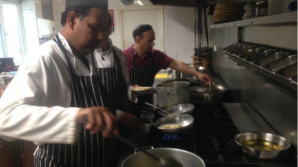 Inside the kitchen of Le Raj in Epsom