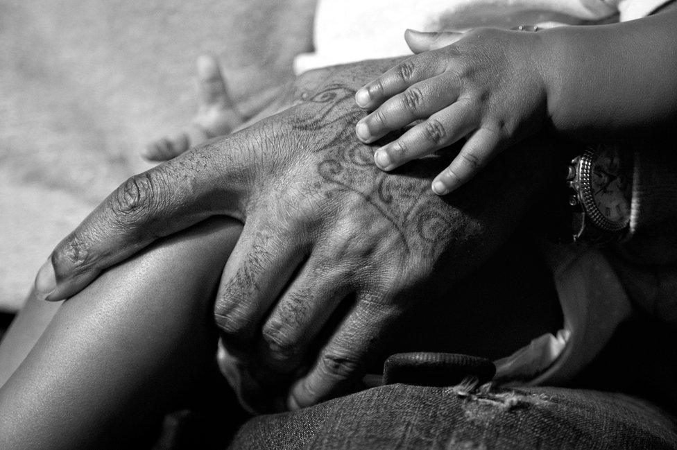 Guy and his daughter at home