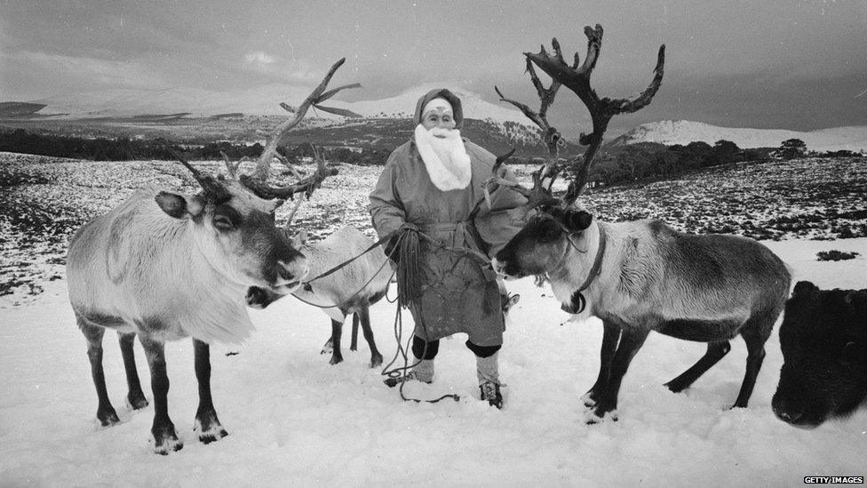 Santa Claus with reindeer