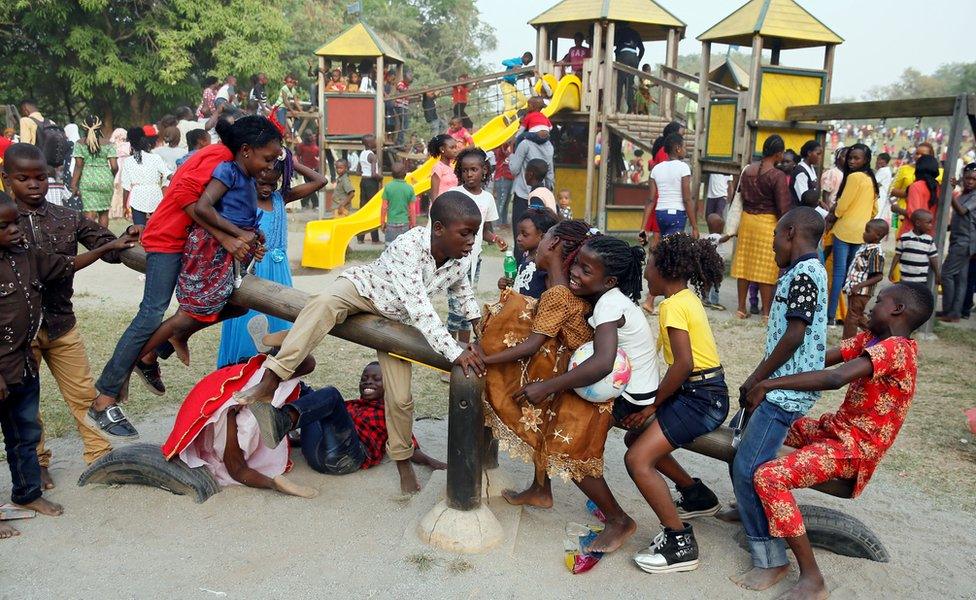 Children playing on the seesaw at the Millennium park in Abuja, Nigeria - Monday 1 January 2018