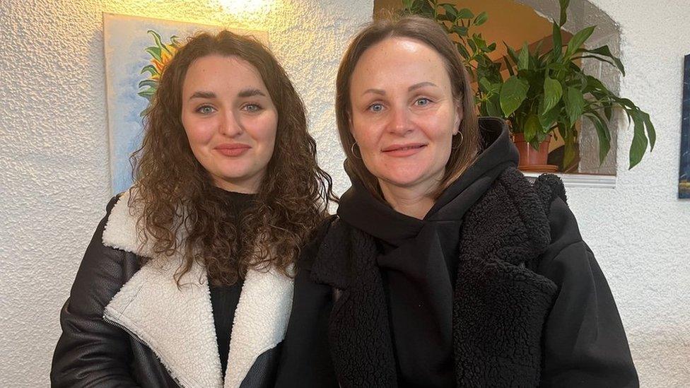 Hanna and Svitlana sitting with coffee in Lena's Ukrainian Kitchen in Hull city centre